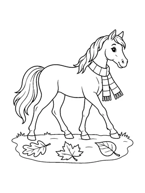 A cute horse in a striped scarf walks among broad fallen leaves.