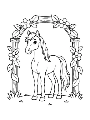 A cute horse stands beneath a wooden arch decorated with broad leaves and flowers.